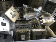 Box of New Electric Sockets and Switches Brass / Silver