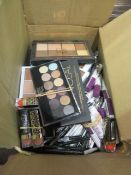 Circa. 200 items of various new make up acadamy make up to include: burn baby burn vivid lipsti...