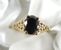 Gold Ring With Black Stone