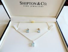 Sterling Silver Topaz Necklace and Earrings Set