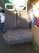 Double van seat and single drivers with belts
