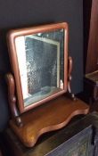 Antique Victorian scroll arm toilet mirror.