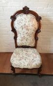 An antique Victorian high back Nursing Chair.