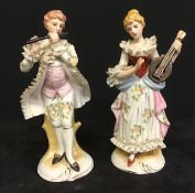 A par of continental china figures