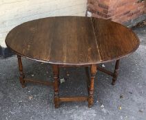 A 20 century oak gate leg table.