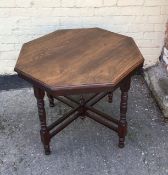 An antique mahogany octagonal centre table