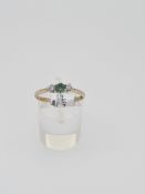 UK hallmarked 9ct gold emerald and diamond ring