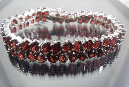 Silver bracelet with garnet