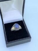 Suarti doublet opal silver and gold ring