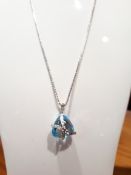 9ct 375 White Gold Diamond & Trillion Cut Topaz Pendant on a Silver Chain Necklace