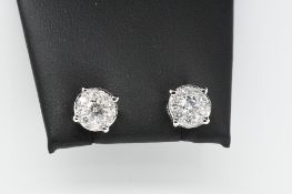 Pair of Round Diamond Earrings.