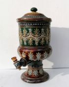 A Doulton Lambeth stoneware water filter with original spigot, relief moulded foliate decoration