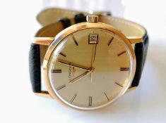 A vintage Longines manual gent's 9ct gold-cased watch with replacement strap, gilt dial 32mm,