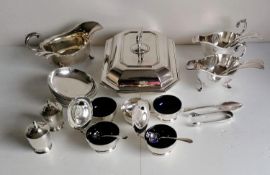 A selection of Garrard & Co. Regent plate to include: entree dish, pair of sauce boats, one other,