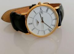 A Longines 18ct gold-cased quartz wrist watch, white dial, Roman numerals, date aperture, inner