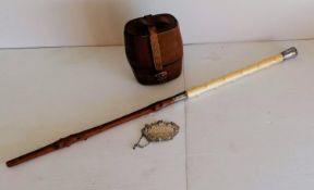 A late 19th century campaign cutlery set mounted with ivory in a leather pouch to include a