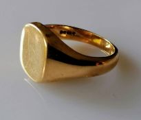 A 9ct yellow gold signet ring, size W, head size 15mm x 13mm, hallmarked, 13.02g