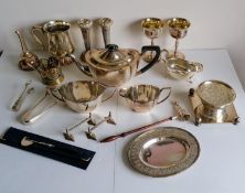 A selection of silver plated items to include a three-piece Unity Plate tea service, goblets, wine