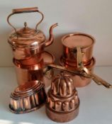 Two Victorian shaped copper jelly moulds, three graduated tin-lined copper pots with lids