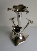 An Edwardian silver four-trumpet epergne, the central trumpet surrounded by three smaller trumpets