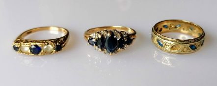 A five-stone marquise-cut sapphire ring with diamond decoration in a claw setting, import marks, a