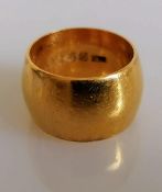 A 22ct yellow gold wedding band, 10mm, size F, hallmarked, 11.35g