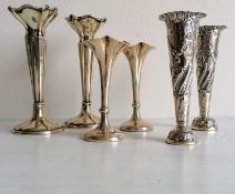 A George V pair of silver posy holders by Henry Matthews, Birmingham, 1919, 14 cm H; a Victorian