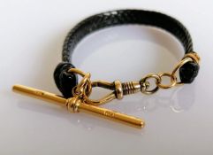 A dark brown woven leather pocket watch Albert strap with 14ct gold T-bar, stamped and dog clip,