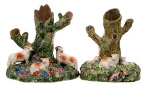 Two Staffordshire pearlware sheep and tree trunk spill groups: each mound base applied with sheep,