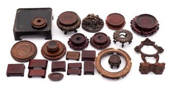 A mixed lot of Chinese wood stands: including a cover and an upright plaque stand [a lot].