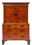 An early 18th Century walnut and feather banded escritoire:,