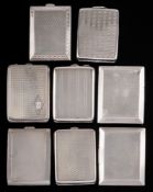 A collection of eight assorted silver match book cases,