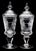 A pair of Bohemian engraved glass goblets and domed covers: in eighteenth century style,