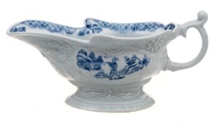 A rare First Period Worcester high-footed sauceboat: of rococo silver shape moulded with floral