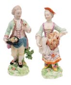 A pair of Derby figures of children emblematic of Spring and Summer: the boy holding a posy in one