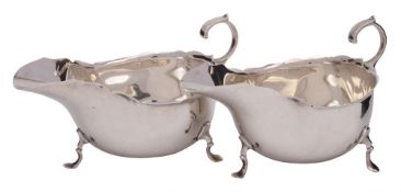 A pair of Edward VII silver sauceboats, maker Martin, Hall & Co, Sheffield,