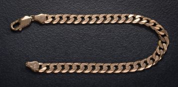 A 9ct gold flat curb-link bracelet on lobster clasp.