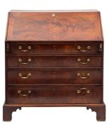 A George III mahogany bureau:,