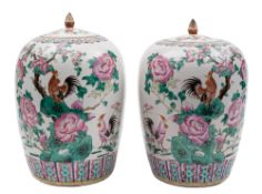 A pair of Chinese famille rose vases and covers for the Straits market: of oviform with lotus bud