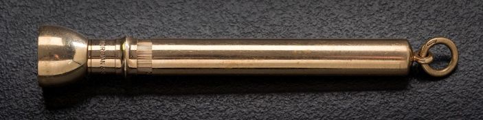 S Mordan & Co. A 9ct gold cigar cutter stamped 'SM & Co': approximately 19gms gross weight.