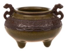 A Chinese tea-dust and imitation bronze glazed tripod censer: in archaistic style with dragon