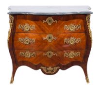 A late 18th Century Swedish kingwood, crossbanded and gilt metal mounted serpentine bombe commode:,