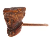 A small 19th Century carved wood pipe: the bowl in the form of a lady's head, 12cm long.