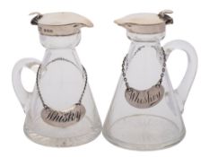 An Edwardian clear glass and silver mounted whisky noggin, maker S Blanckensee & Son Ltd,