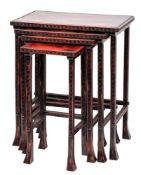 A set of Chinese scarlet and black variegated quartetto tables: the rectangular tops with Greek key
