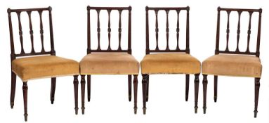A set of four early 19th Century mahogany dining chairs:,