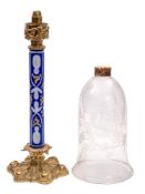 A 19th Century gilt metal and overlay blue glass storm lantern: the floral decorated capital on a