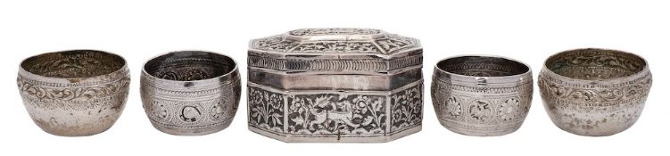Two pairs of Burmese silver salts: of circular outline with foliate banded decoration, 5.