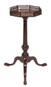 A George III mahogany octagonal kettle stand:,