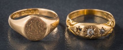 An 18ct gold diamond-set 'gypsy' ring and an 18ct gold signet ring.